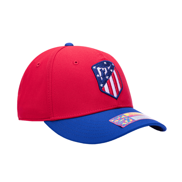 Side view of the Atletico Madrid Core Adjustable hat with mid constructured crown, cruved peak brim, and slider buckle closure, in Red/Blue.