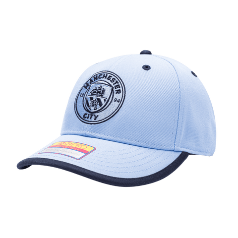 Manchester City Tape Adjustable with high crown, curved peak brim, and adjustable buckle strap closure, in Light Blue